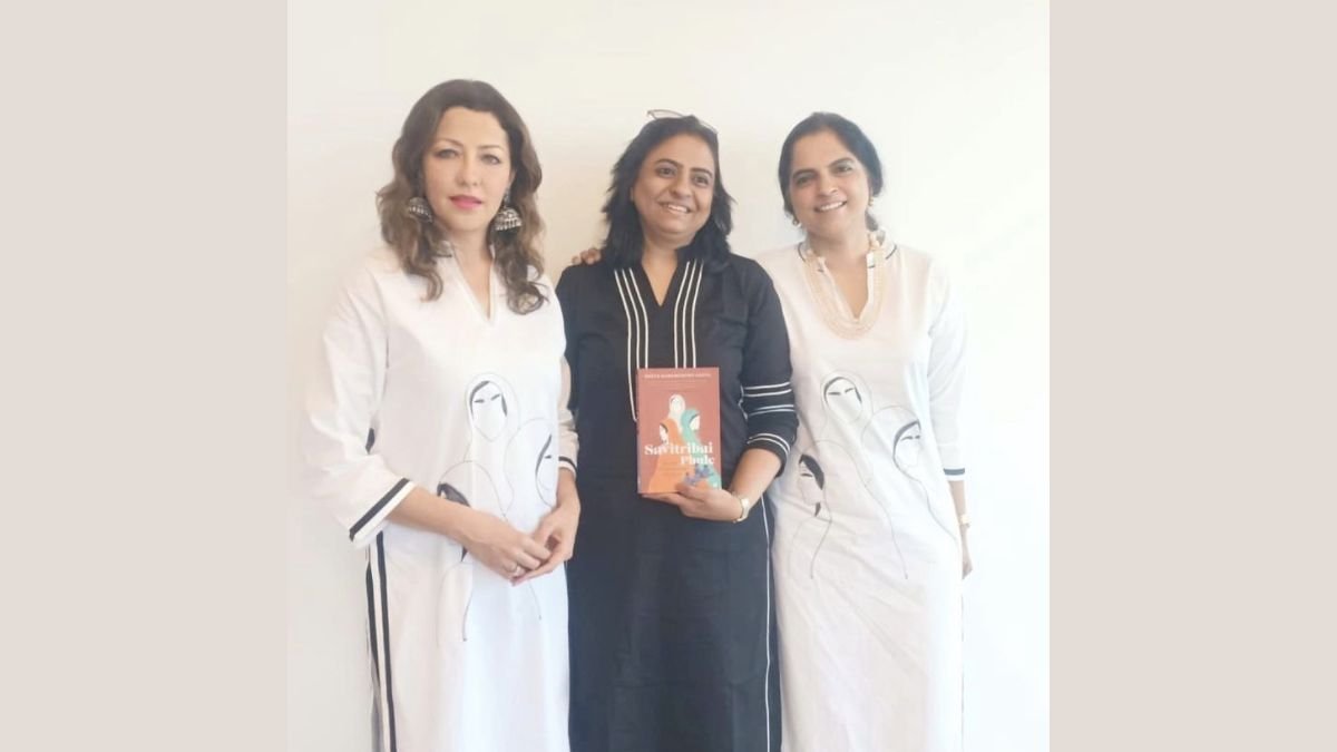 Dr Aditi Govitrikar and author Reeta Ramamurthy Gupta sport Pret label ‘House of Maana’s tribute to Savitribai Phule book